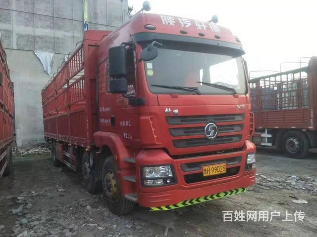转让二手德龙9.6米高栏载货车 前四后八轮 国五的图片