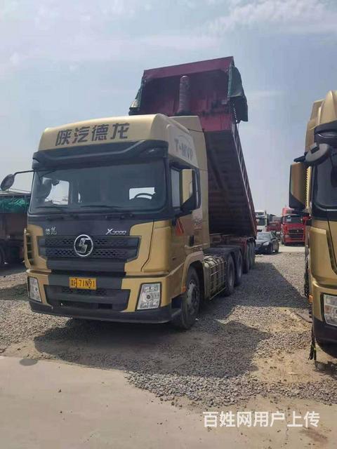 二手德龙牵引车 550马力 国五 9.5米后翻自卸的图片