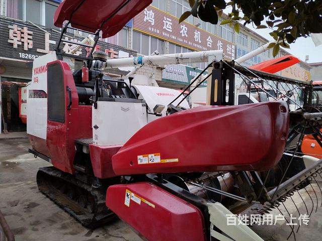 合作社拆迁处理洋马85收割机的图片