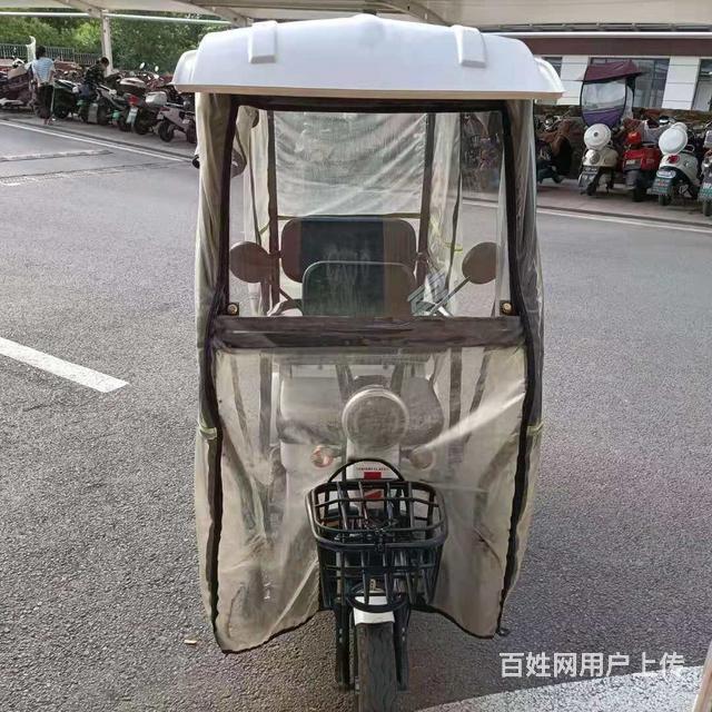转让购买一年半带蓬接送孩子的三轮车的图片