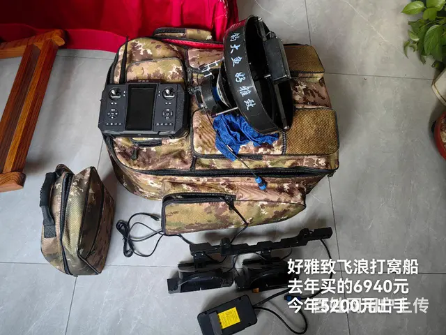 出手钓鱼打窝船，海竿，钓鱼轮 - 图片 1