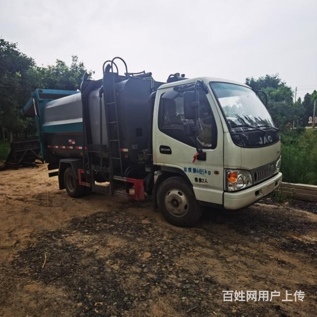 二手蓝牌7立方侧挂压缩垃圾的图片